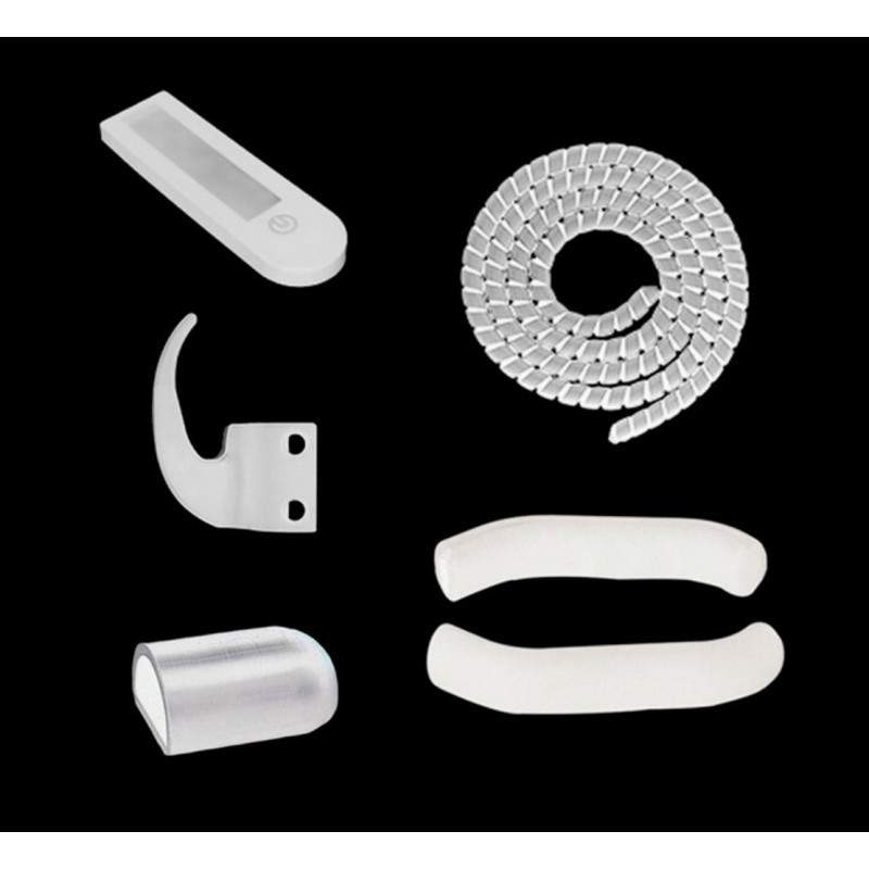 Kit med silikonskydd plus kabelskydd och en krok för väskor.  - 3 Kit med silikonskydd plus kabelskydd och en krok för väskor.
K